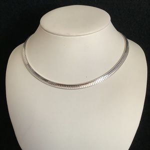 Vintage silver tone omega necklace.